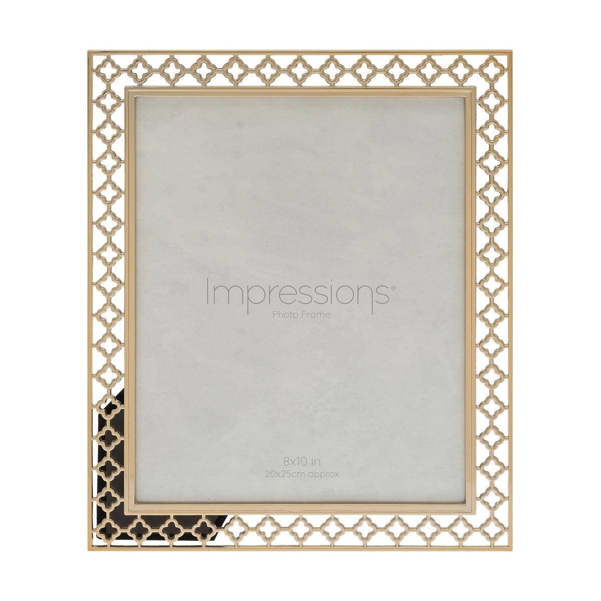 Gold freestanding metal photo frame with a cut-out lattice quatrefoil border and plain outer rim, holding a 10 x 8in print, shown on a white background.