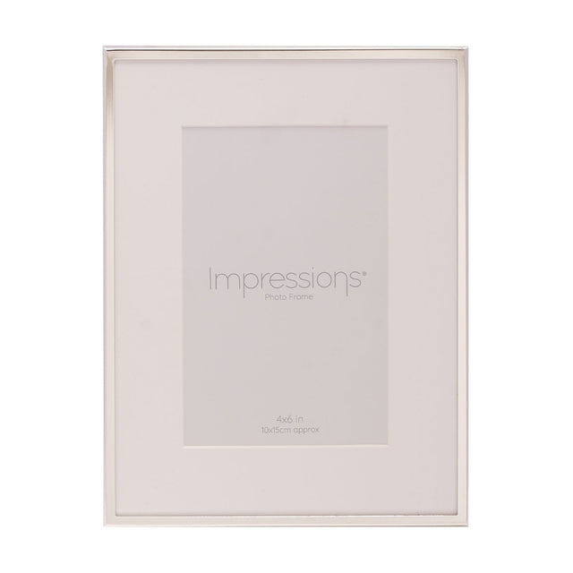 Silverplated photo frame with slim silver edge and wide white mount for a 6 x 4in photo, shown upright on a plain white background.