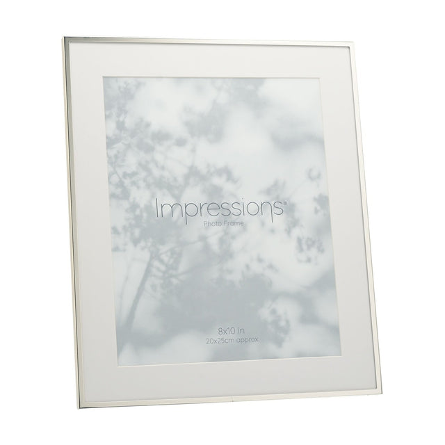 Silverplated rectangular photo frame with slim polished silver edge and white mount border for a 10 x 8in print, shown angled on a plain white background.