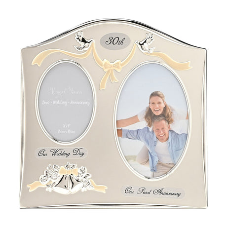 30th Anniversary silverplated double photo frame with arched top, gold ribbon and bow, silver doves, two oval openings labelled Our Wedding Day and Our Pearl Anniversary.