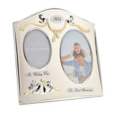 30th Anniversary silverplated double photo frame with arched top, gold ribbon and bow, silver doves, "Our Wedding Day" and "Our Pearl Anniversary" plaques, on a white background.