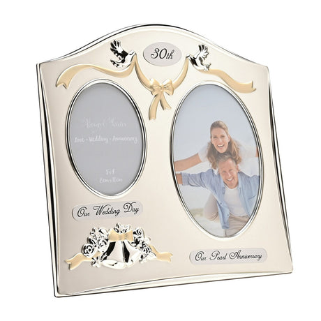 30th Anniversary silverplated double photo frame with arched top, gold ribbon and bow, silver doves, "Our Wedding Day" and "Our Pearl Anniversary" plaques, on a white background.