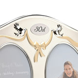 30th Anniversary double photo frame in silverplated finish, arched design with gold ribbon bow, silver doves, and "30th" plaque between two oval photo openings.