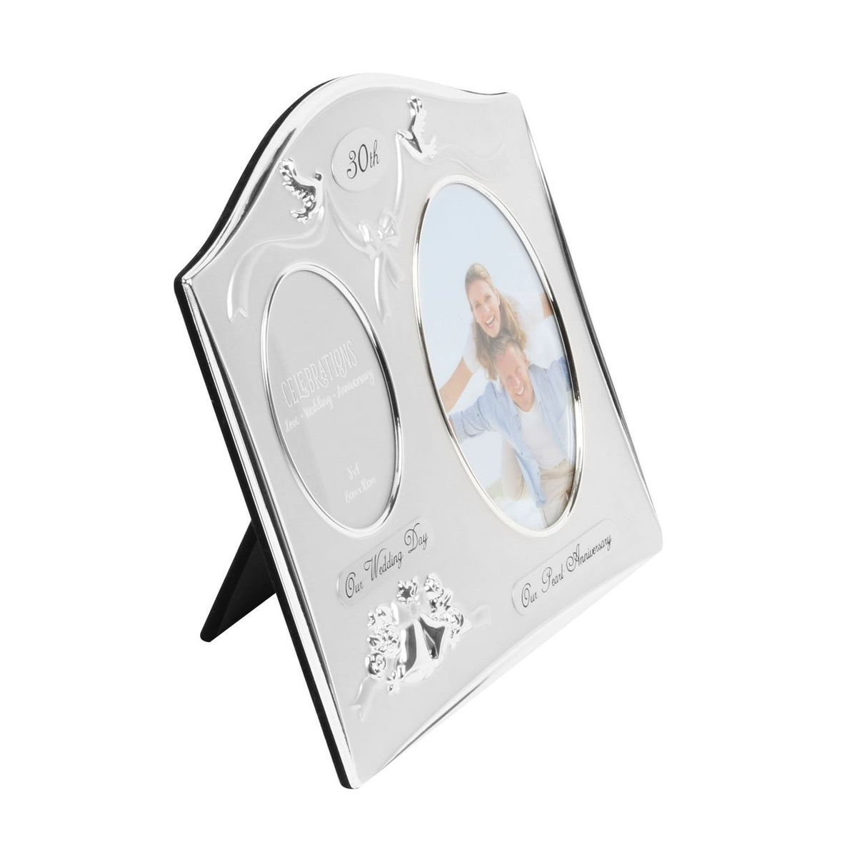 Arched silverplated double photo frame with an oval opening for a couple's photo and a smaller oval for the wedding image, dove details and a "30th" plaque at the top, shown on a white background.