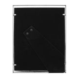 Rear view of the rectangular photo frame showing a black velvet backing with a fold-out strut for tabletop display, set within the slim silver-plated metal rim.