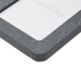 Close-up of the Speckled Rounded Wooden Photo Frame 7 x 5in corner, showing a grey speckled border with fine white flecks and rounded edge against a white background.