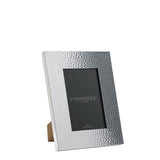 Rectangular photo frame with a hammered-effect silver plastic surround and mitred corners, holding a 4x6 in Impressions sample print, shown at an angle on a plain white background.