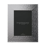 Rectangular hammered-effect photo frame in silver plastic with a mitred border, holding a 5x7 in insert card, shown on a white background.