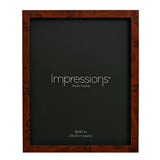 Rectangular photo frame with dark brown burr effect plastic finish, holding an 8x10in black insert, shown on a plain white background.
