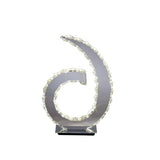 The Galaxy LED Crystal D Shape Table Lamp features a polished chrome metallic frame with crystal accents, emits 12W 4000K bright white light, and sits on a rectangular black base—ideal for modern ambient lighting.