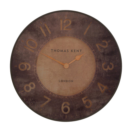 Harvenne Wall Clock by Gallery Direct, a round Thomas Kent London clock with distressed brown dial, raised gold Arabic numerals, and slim metal frame.
