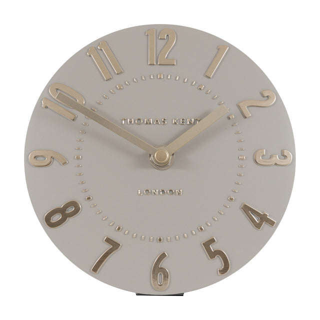 Gallery Direct Mulvorne 6 inch mantel clock with a round silver cloud grey dial, raised metallic Arabic numerals and slim hands, on a white background.