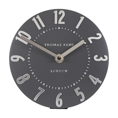 Thomas Kent Mulvorne 6 inch mantel clock in graphite grey with raised silver 3D Arabic numerals and slim metal hands on a plain background.