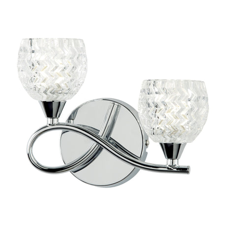 Gallery Direct Boryana 2 light wall fitting in chrome with looped arms and textured chevron-pattern clear glass shades on a plain background.