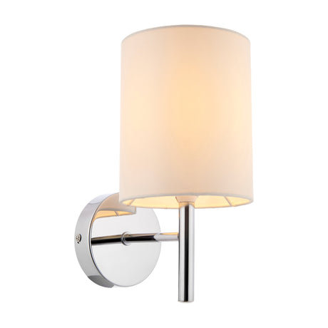 Gallery Direct Brovenna Wall Light with a white fabric cylinder drum shade on a slim chrome arm and round back plate, shown lit against a white background.