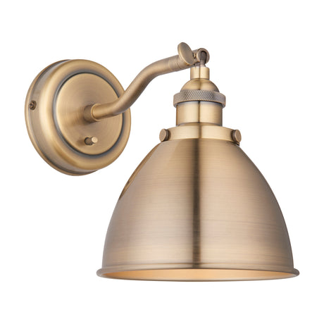 Fravien Wall Light by Gallery Direct, a compact industrial-style fitting with domed steel shade, adjustable arm and knurled collar in antique brass finish.