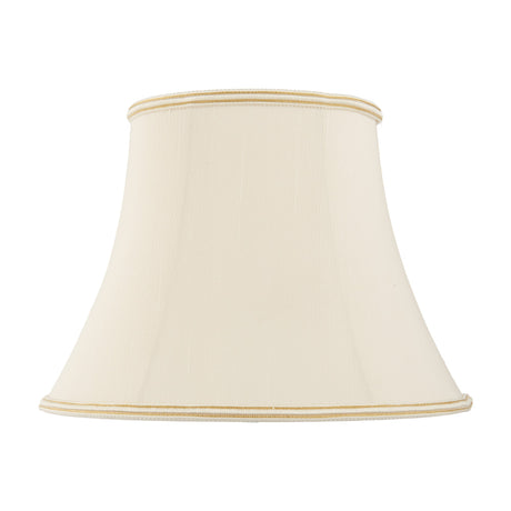 Gallery Direct Celvenne bowed lamp shade in cream pleated fabric with gold and cream trim on the top and bottom edges, on a plain white background.