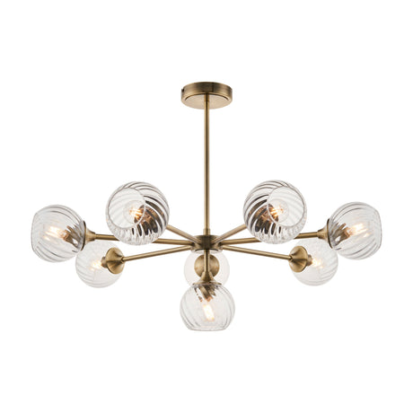 Gallery Direct Amalise 8 Light Pendant with swirled clear glass globes on staggered antique brass sputnik arms and ceiling rod.