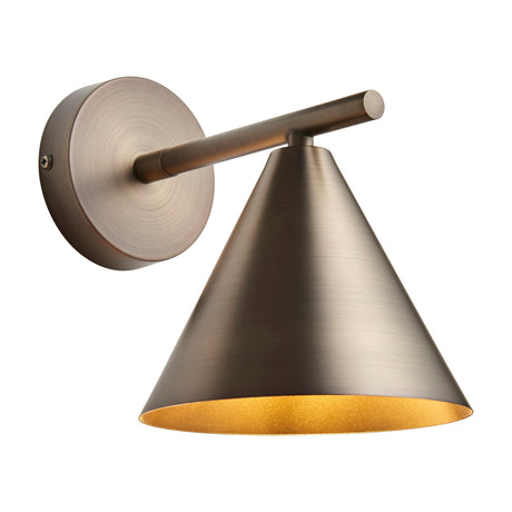 Gallery Direct Kessora Cone Wall Light in antique bronze steel with slim horizontal arm, round wall plate and tapered cone shade with warm gold interior.