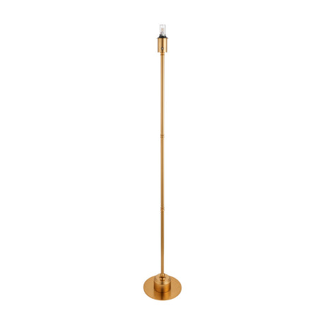 Gallery Direct Burwyn rechargeable floor lamp in aged brass with slender turned steel column, weighted round base and E27 holder on white background.
