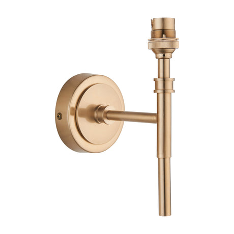 Gallery Direct Chesvael wall light fitting in brushed aged brass, with round backplate, slim arm and exposed B22 lamp holder on a white background.