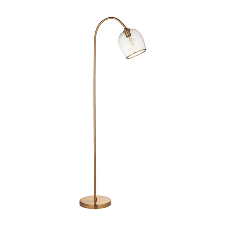 Gallery Direct Vellamis arched floor lamp in brushed aged brass with a clear glass dome shade and weighted circular base, shown on a white background.