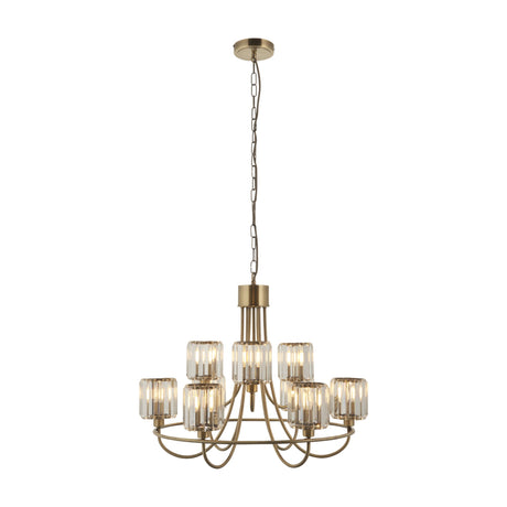 Gallery Direct Veranelle 9 Light Tiered Chandelier in antique brass with faceted clear glass shades on curved arms and chain suspension.