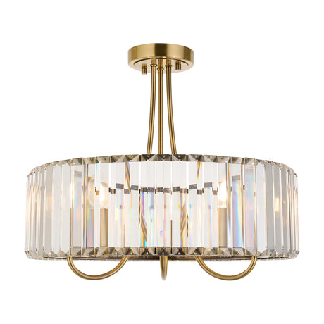 Gallery Direct Ostrelle 3-light semi-flush ceiling light with faceted clear crystal drum shade and antique brass frame on a white background.