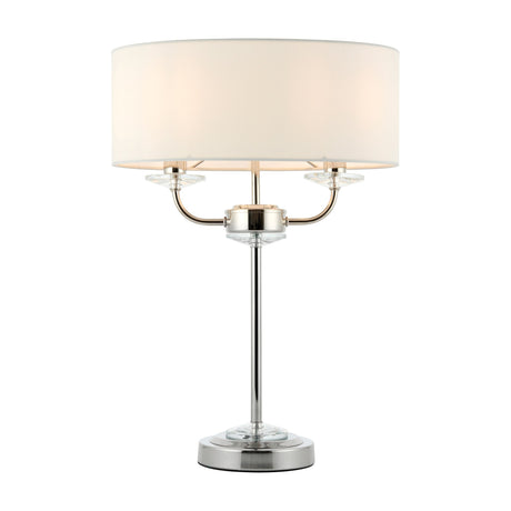 Gallery Direct Ostwyn 2 Light Table Lamp with polished nickel frame, crystal glass accents and a white fabric drum shade on a plain background.