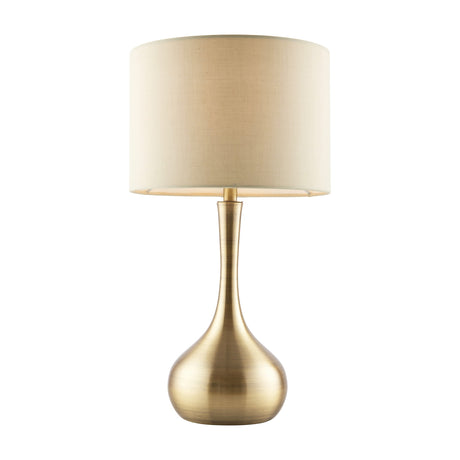 Gallery Direct Picvenne touch dimmer table lamp with a curved brushed brass base and taupe fabric drum shade on a plain white background.