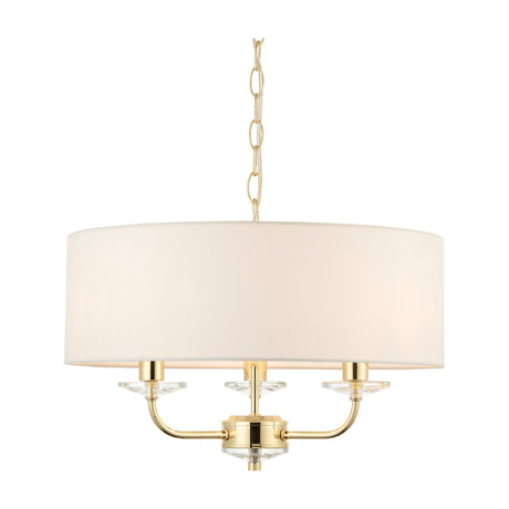 Gallery Direct Ostwyn 3 Light Pendant with brass finish, vintage white fabric drum shade, three curved arms with faceted crystal accents, and chain suspension.
