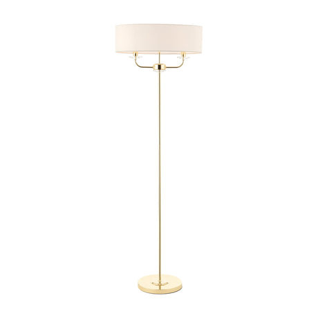 Gallery Direct Ostwyn 2 Light Floor Lamp in brass with vintage white fabric drum shade, twin-arm fitting with crystal accents, and round weighted base.