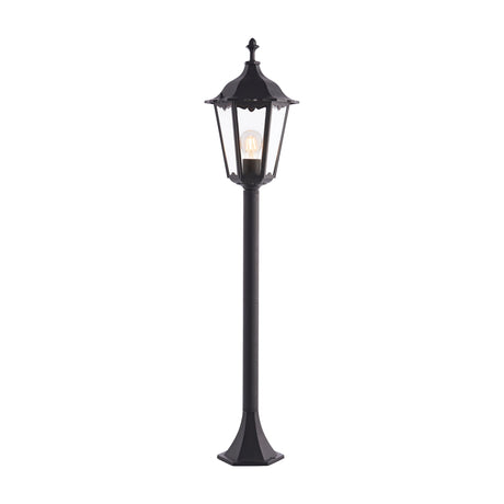 Gallery Direct Burvael outdoor post lantern in matt black die cast aluminium with clear glass six-sided head, finial top and hexagonal base.