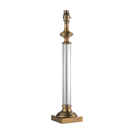 Gallery Direct Avrenne table lamp base with clear glass column, antique brass turned fittings and stepped square base, B22 fitting, shown on white.