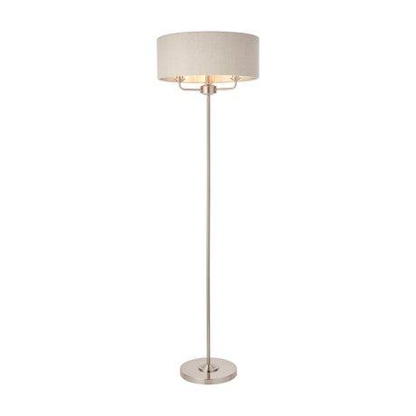 Gallery Direct Clervorne 3 Light Floor Lamp with a slim chrome stem, round weighted base and wide neutral fabric drum shade on a white background.