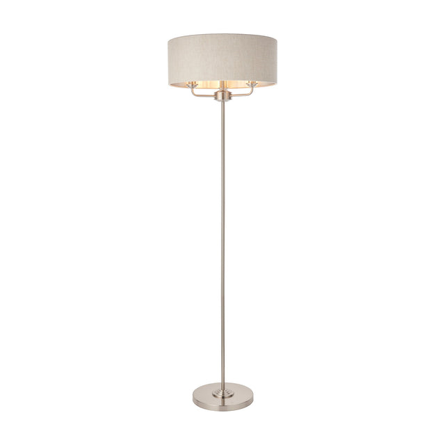 Gallery Direct Clervorne 3 Light Floor Lamp with a slim chrome stem, round weighted base and wide neutral fabric drum shade on a white background.