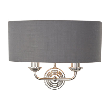 Gallery Direct Clervorne 2 Light Wall Light with a charcoal half-drum fabric shade and polished nickel twin-arm backplate on a white background.