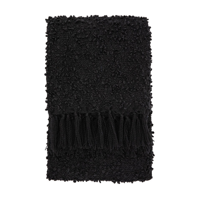 Gallery Direct Bolvane Textured Throw folded to show black bouclé looped weave and chunky knotted tassels on a plain white background.