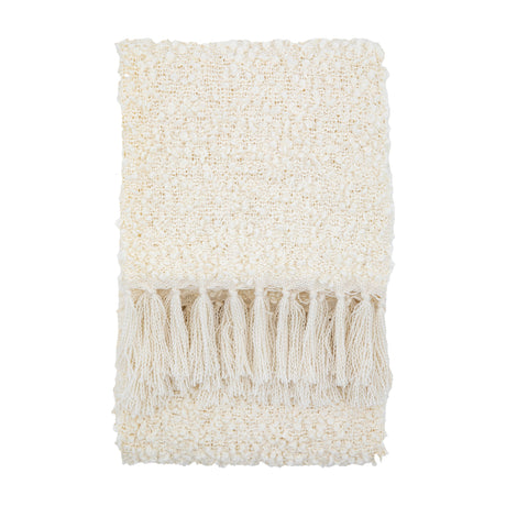 Gallery Direct Bolvane folded cream bouclé textured throw with chunky knotted tassels along the end, shown on a plain white background.