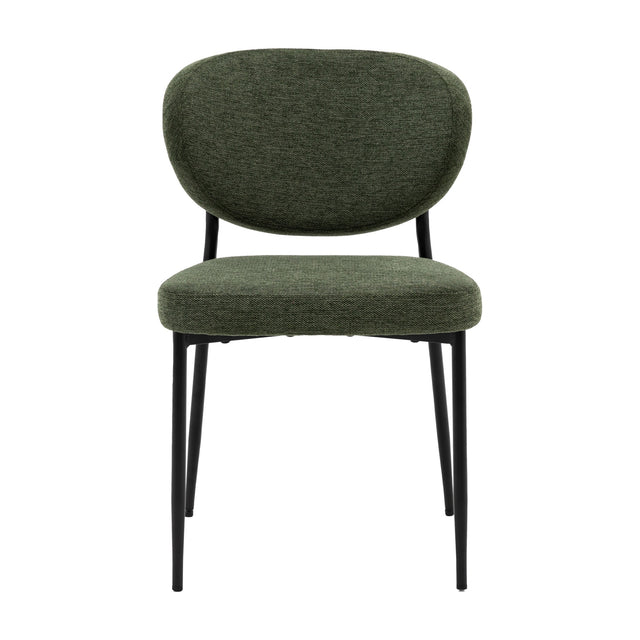 Gallery Direct Opvenne dining chair in green woven polyester with a rounded padded back, cushioned seat and slim tapered black iron legs.