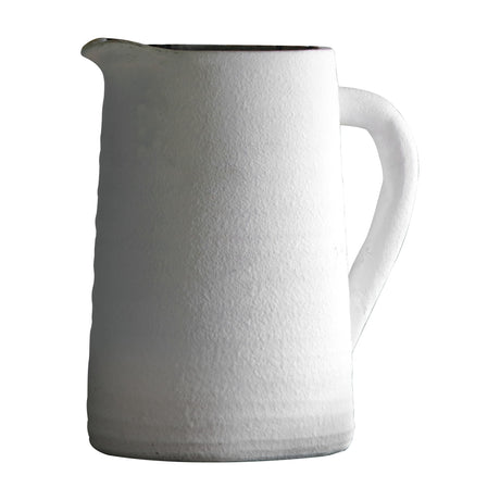 Gallery Direct Stenvane textured terracotta jug vase in chalky white with tapered body, lipped pouring spout and single looped handle on a white background.