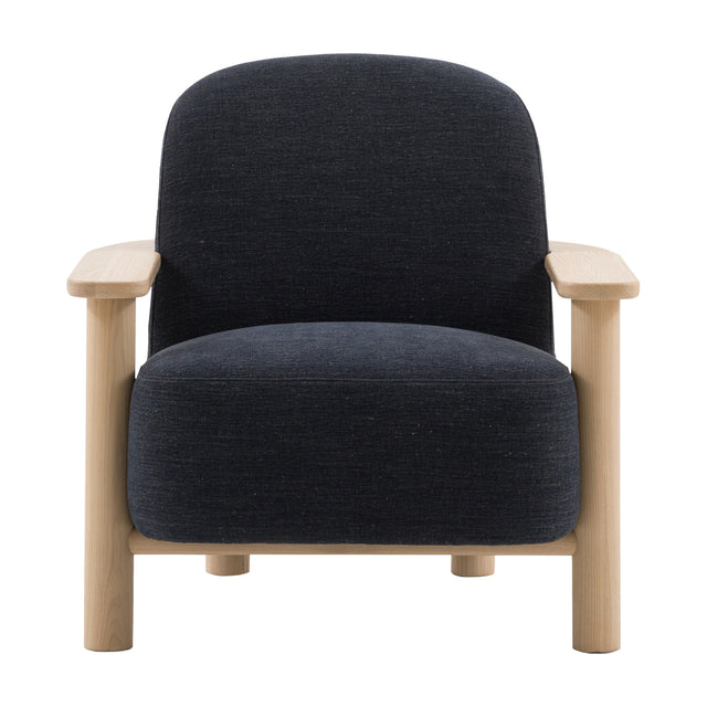 Husvane Armchair by Gallery Direct with dark navy woven upholstery, curved back, foam seat cushion, flat ash armrests and turned cylindrical legs.