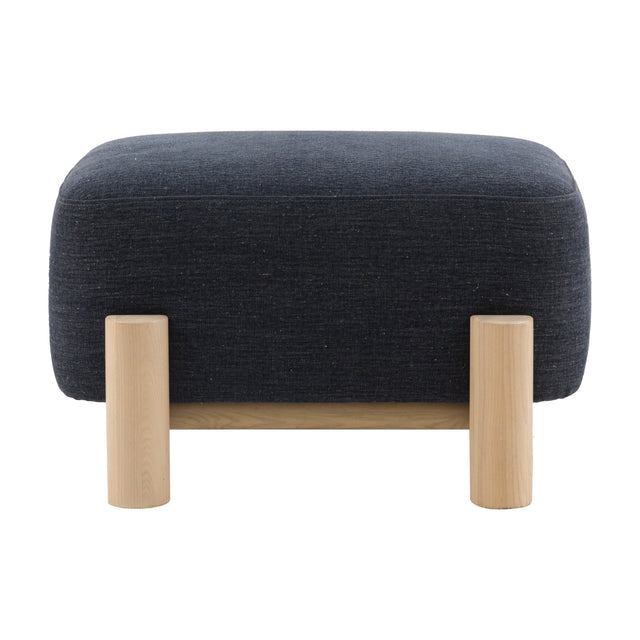 Gallery Direct Husvane Footstool with a rounded dark navy woven fabric top on four turned natural ash legs, shown on a plain white background.