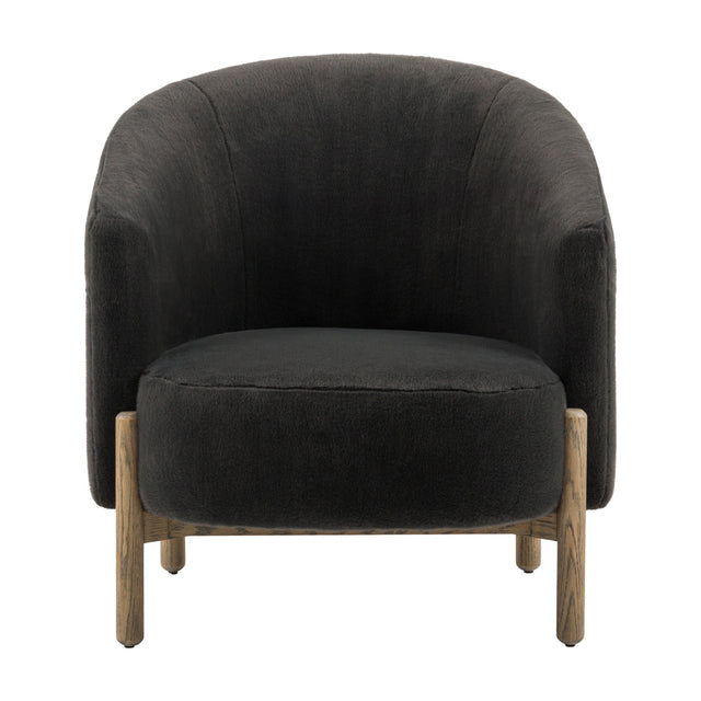 Gallery Direct Tinvane rounded tub armchair in graphite faux shearling on an exposed solid oak frame, front view on a plain white background.
