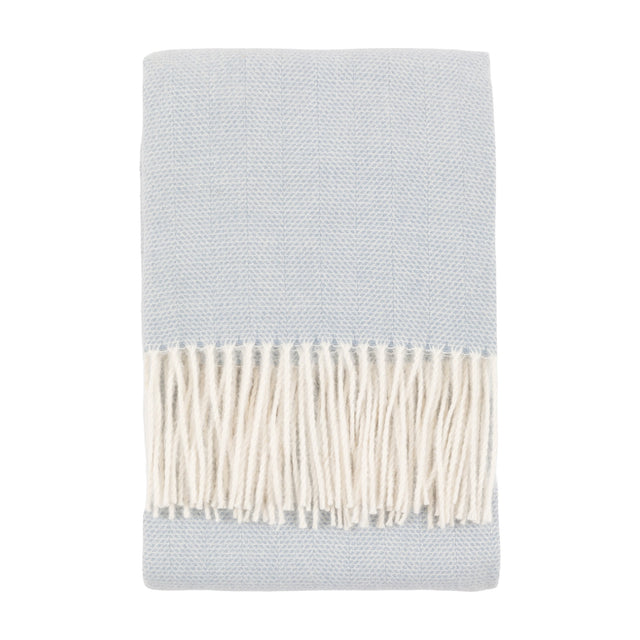 Gallery Direct Casvane Herringbone Throw folded to show pale blue herringbone weave and cream knotted fringe on a plain white background.