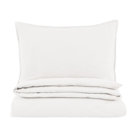 Gallery Direct Albvane washed cotton quilt cover set in white, folded with matching pillow, shown on a plain white background.