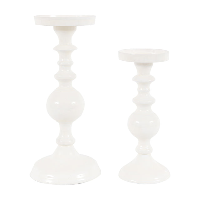 Gallery Direct Alzverne Turned Metal Candlesticks Set of 2 in glossy cream enamel, showing two spooled pillar holders at differing heights.