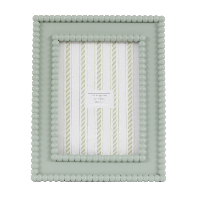 Gallery Direct Covane Beaded Photo Frame in sage green resin with double beaded border, 5x7in aperture, shown upright on a plain white background.