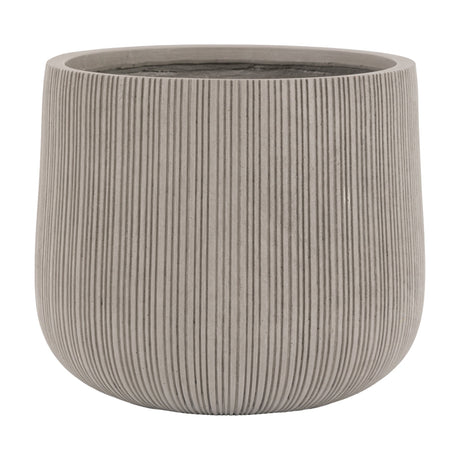 Gallery Direct Denvelle grey magnesium planter with tapered base, rounded sides and vertical ribbed texture from rim to base, on a plain background.