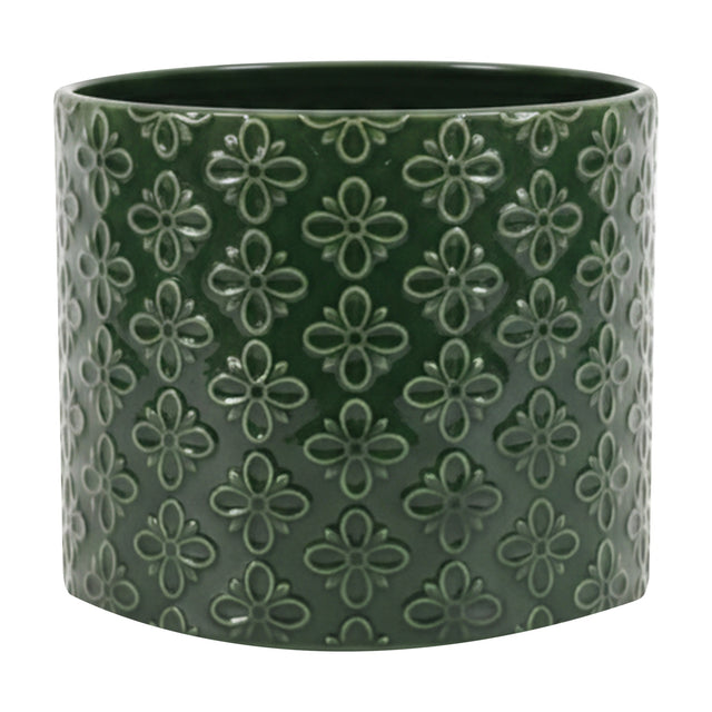 Gallery Direct Selvane Embossed Ceramic Planter in green, a round cylindrical pot with a glossy glazed four-petal floral pattern repeated across the surface.